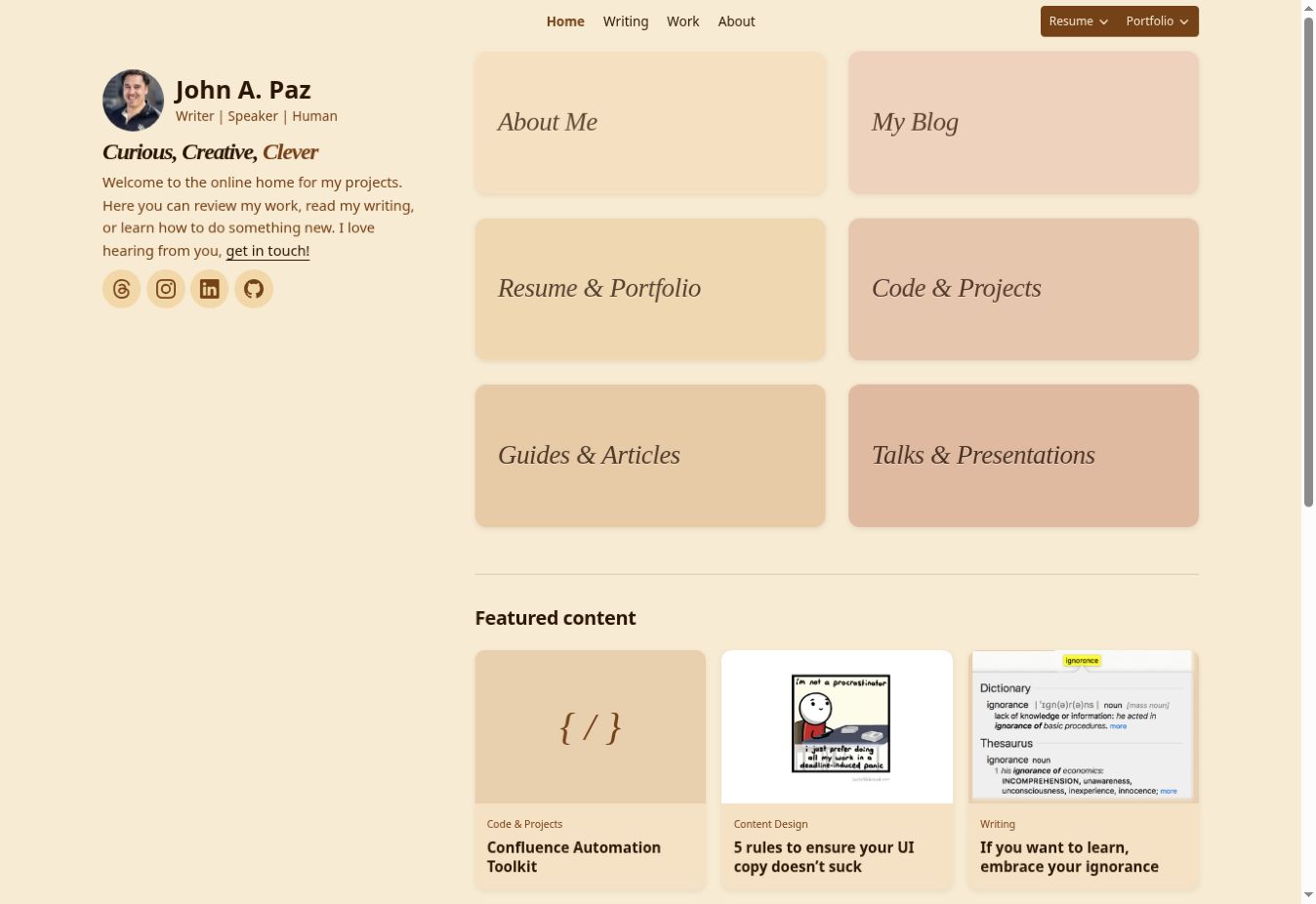 Screenshot of the V2 homepage, with a personal introduction, six canyon-colored section tiles, and featured content below.